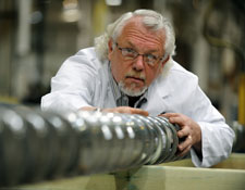 Tim Womer Examining a Screw