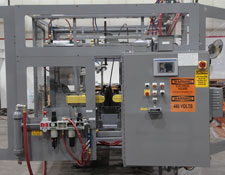 trimmer deflasher with gripper assembly